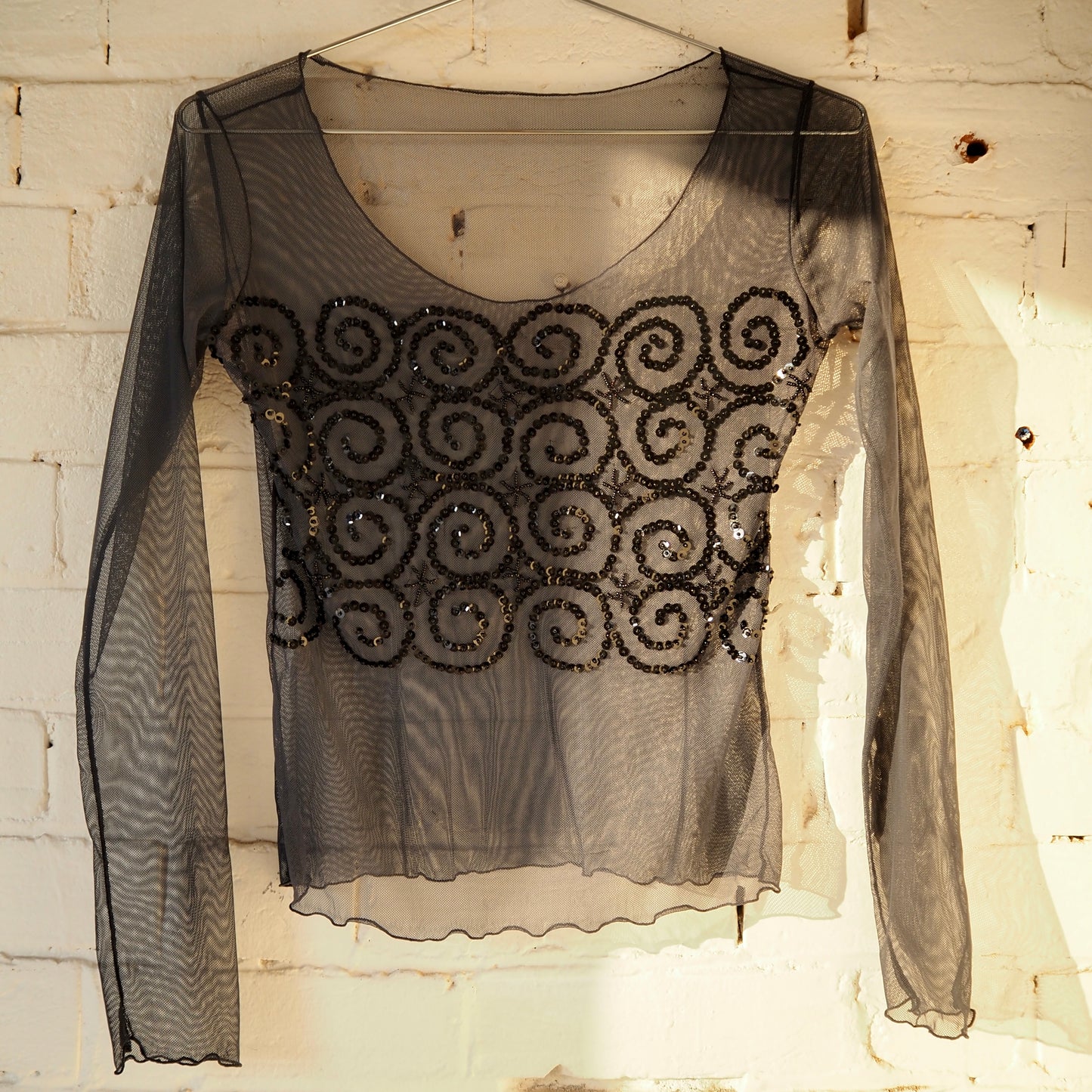Sheer Spiral Top