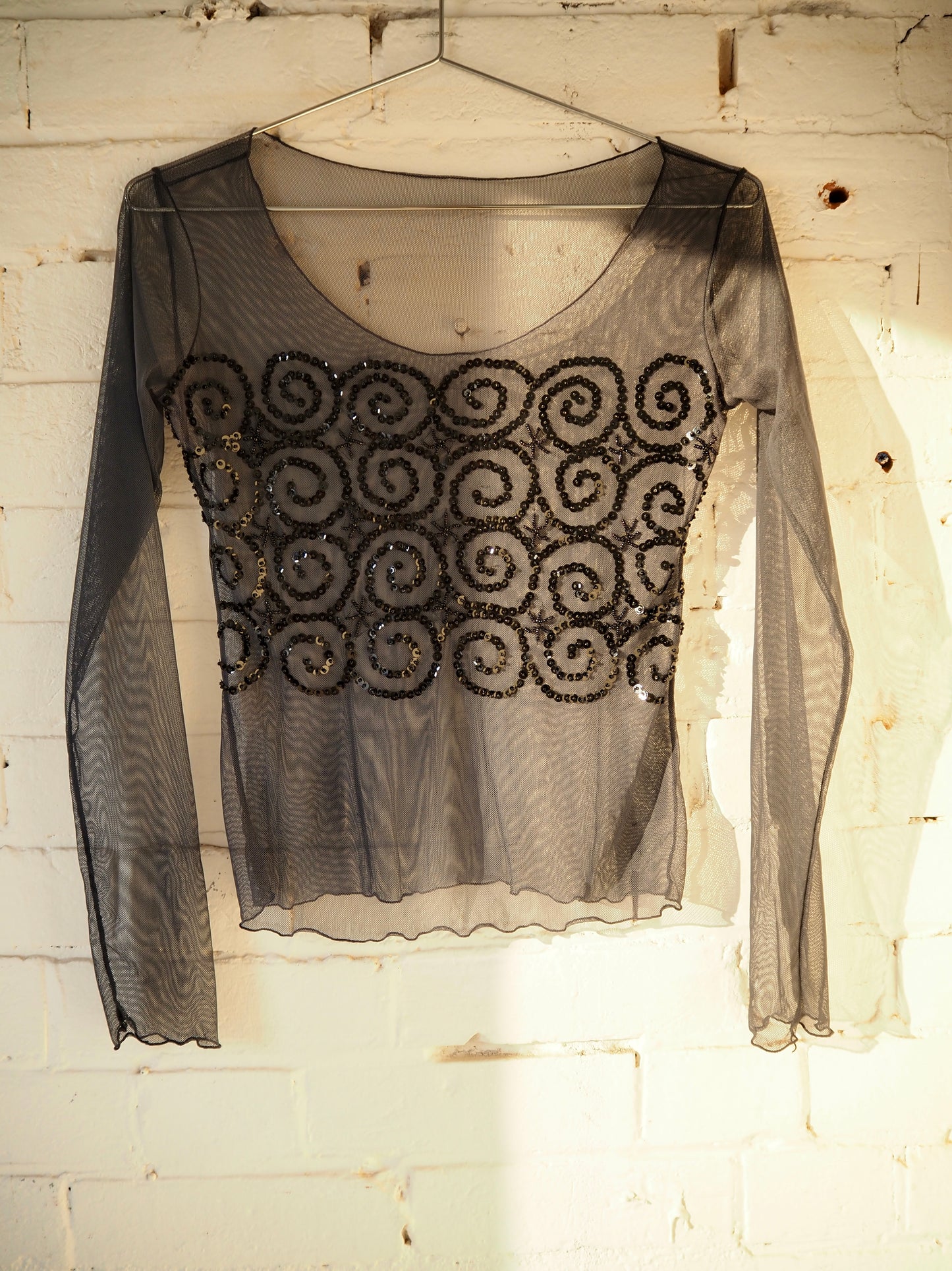Sheer Spiral Top